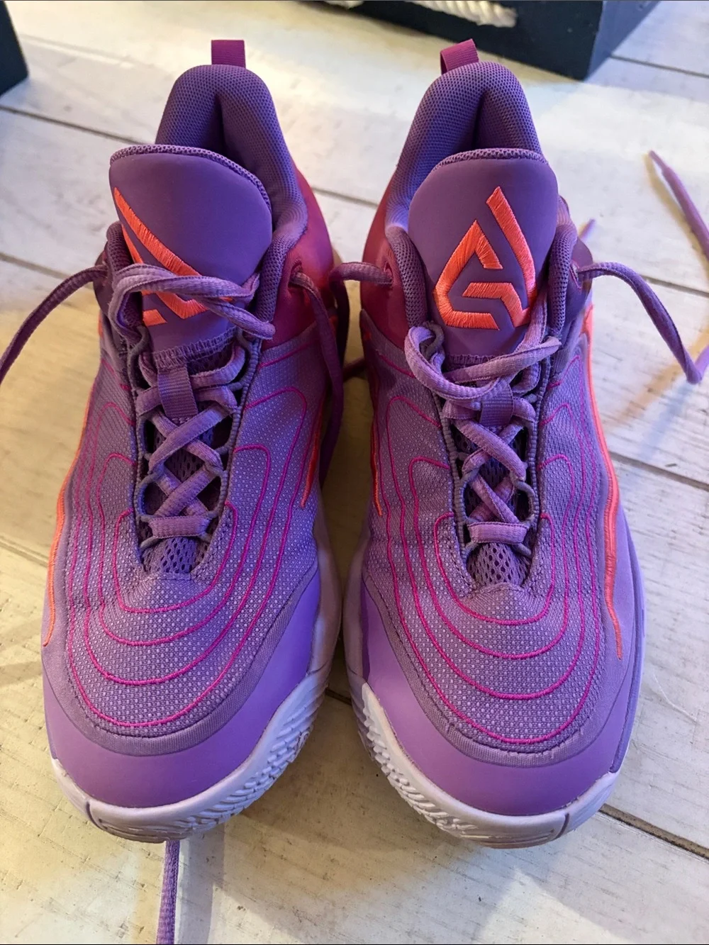 Nike Kids Purple Sneakers with Orange Swoosh